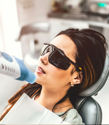 A patient in the dental chair during an exam in Raleigh, NC